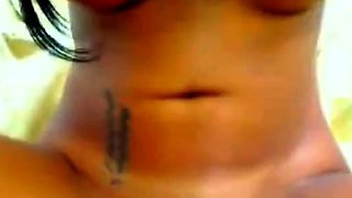 Squirting webcam babe with her cat