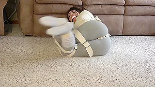 Jennifer straitjacketed, belted, and gagged