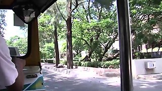 Petite Thai MILF riding in a Tuk Tuk