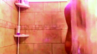 stepmom's big tits (shaving foaming in shower)