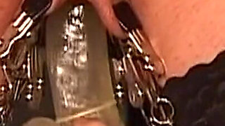 Insatiable Cougar Overwhelmed by Clamps and Thick Dildo