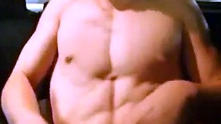Big-Cocked Man Strokes in Car While Watching Porn
