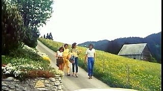 Happy man feeds brunette chick with dick and fucks her on the truck