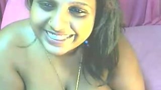 Indian auntie on webcam teases me with her big titties
