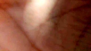 Blonde mature with big boobs masturbates in bed