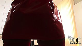Nessa Devil toying her shaved pussy in hot latexwear & heels