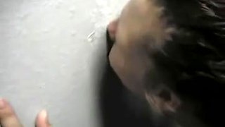 My girlfriend gets facial in a glory hole action