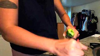Hot French MILF Kahann masturbates with cucumber in kitchen close-up amateur video