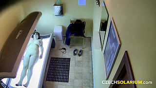Czech Solarium 91: Ginger and Busty MILF Strips Down in Solarium
