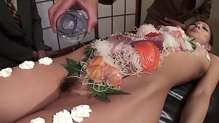 Group Of Business Men Eat Sushi Off Her Beautiful Body