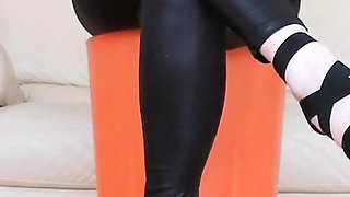 Raven Toe Tapping Crossed Legs with Hight Hells and Latex Pants