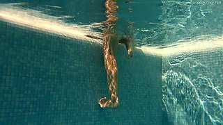 Damn good underwater solo show performed by slender amateur cutie