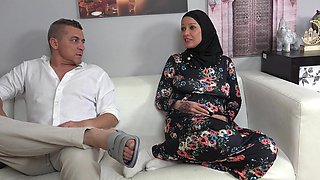Caring wife in hijab wants to please her husband