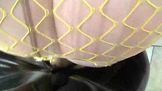Kinky dude in a latex suit fucks his plump maid slave