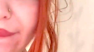 The Redhead Slut Masturbates Her Pussy with the Shower and Enjoys I