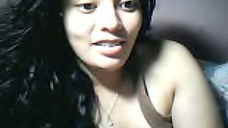 Gorgeous Filipina girl flashing her titties on webcam