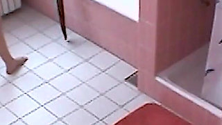 Amateur blonde masturbates on toilet