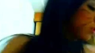 Squirting webcam babe with her cat