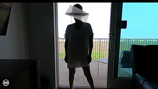 Sunning on the balcony in plain view of everyone walking by