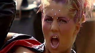 Costumed Couple Dominate Blonde Bitch Outside