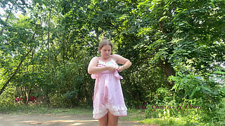 Cute Teen in Costume Playing in the River Like in a Swimming Pool