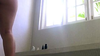 Nude adult lady flashes off fun bags in the shower