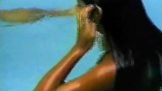 Hot brunette in the pool