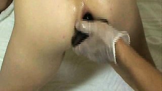 Woman has her asshole pounded and gaped by toys and fists