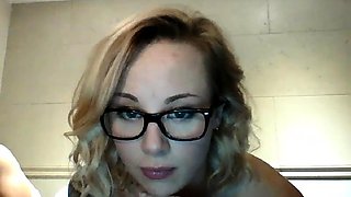 Attractive blonde camgirl with glasses receives a hot facial