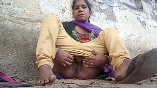 Indian Desi Bhabhi fingering outdoors