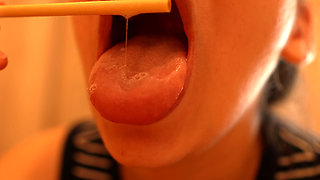 I’m Sucking and Licking a Popsicle, Playing with It Using My Lips and Mouth.