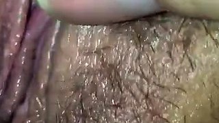 My wife rubbing her dreaming wet pussy and clit