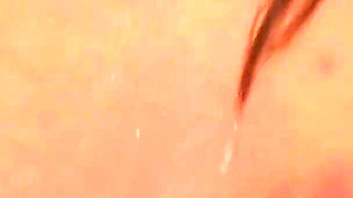 Tkitty Plays Under the Shower