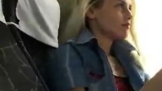 Blond girl bates in the bus