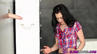 Gloryhole slut bukkaked