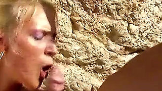 Blonde slutty MILF Mallory fucked in the ass by strangers on the beach