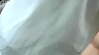Asian older couple in the car