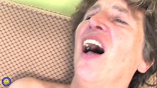 Hairy Granny Felice Gets Her Unshaved Pussy Pounded by a Young Babe with a Strapon